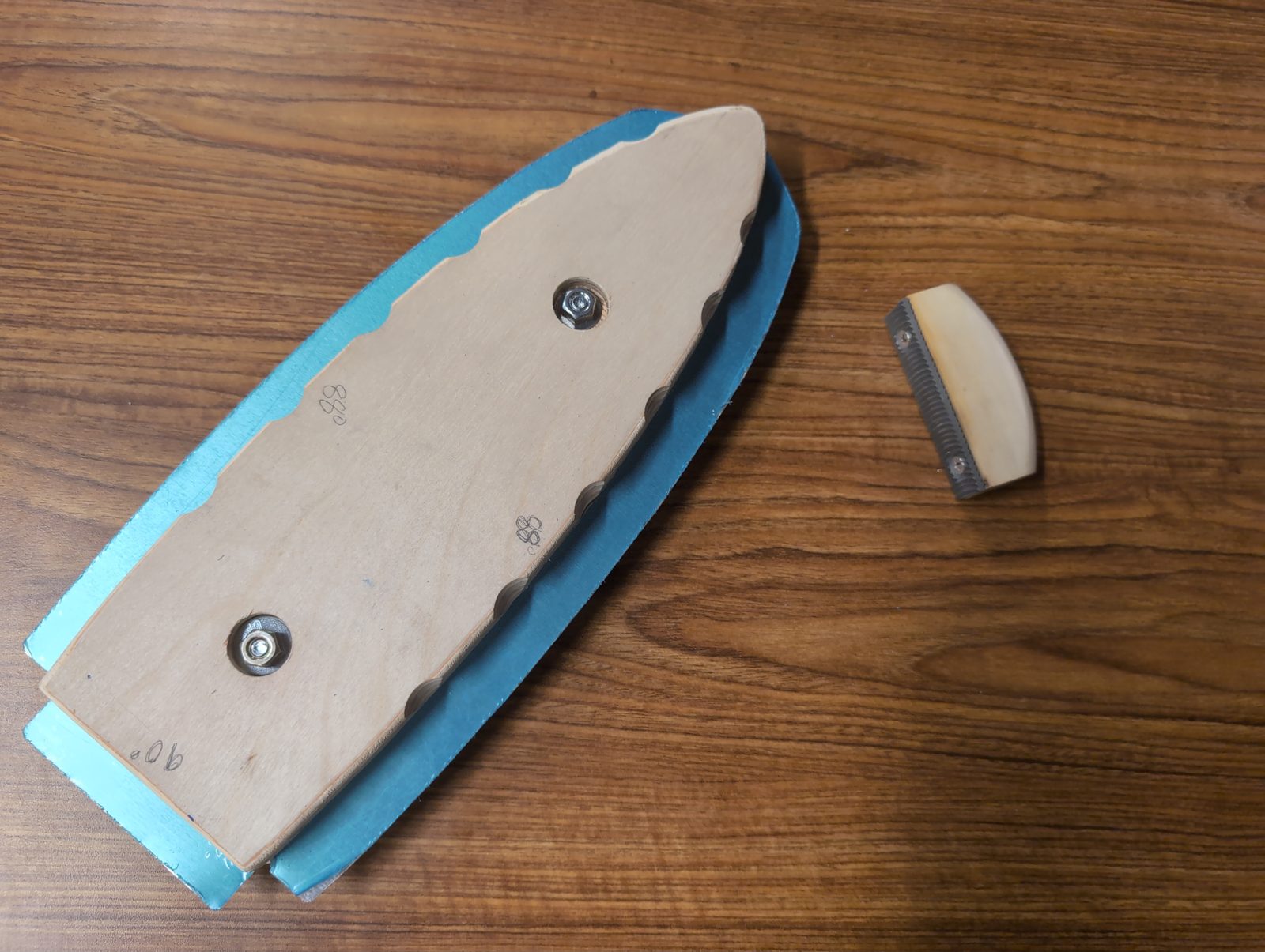 Shaped first curved rib